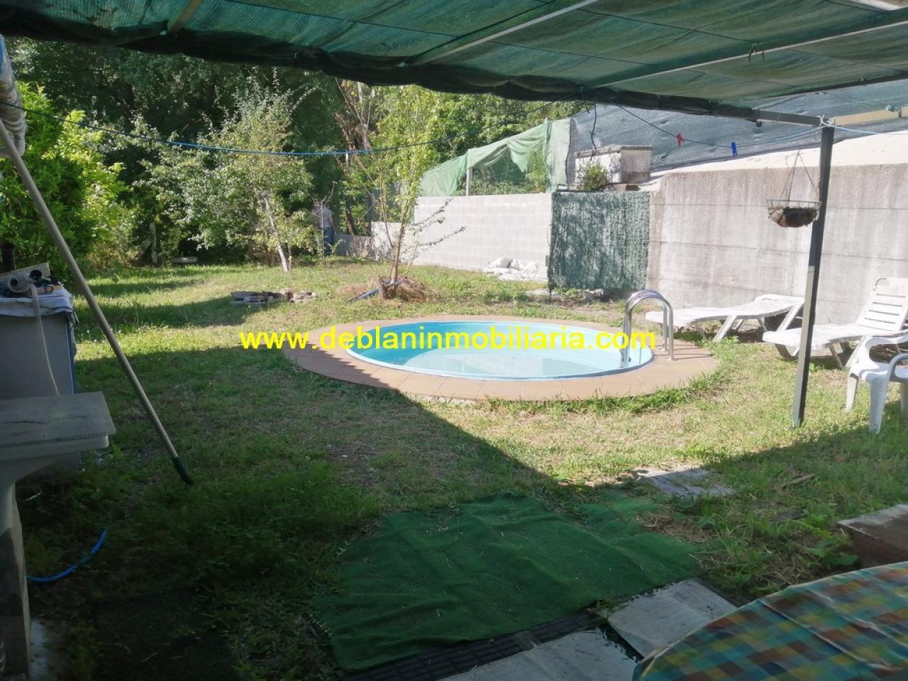 SE VENDE PROPIEDAD CON 2 VIVIENDAS EN TOMIÑO
