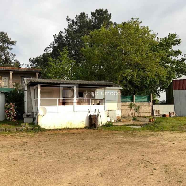 GRAN PARCELA CON BONITO CHALET Y NAVE INDUSTRIAL