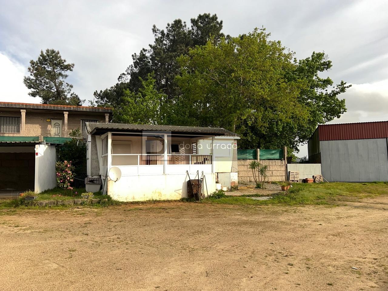 GRAN PARCELA CON BONITO CHALET Y NAVE INDUSTRIAL