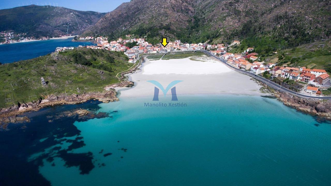 Casa de Piedra con Terreno y Vistas al Mar