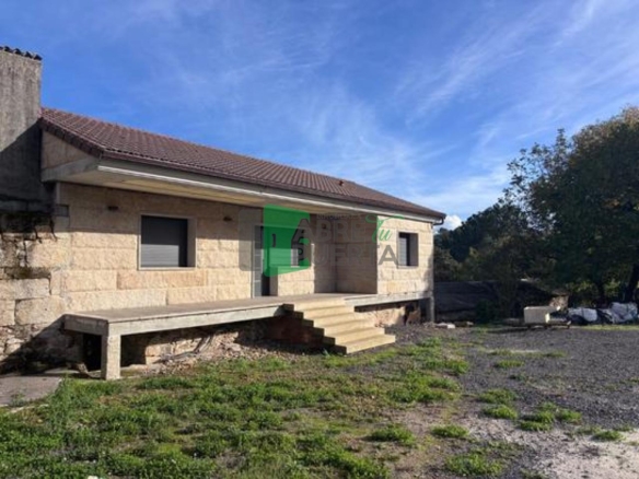 CASA EN A PEROXA