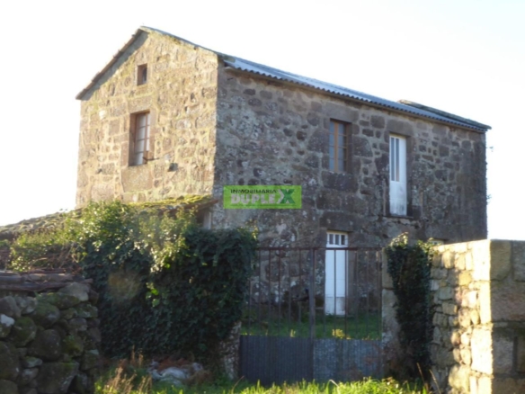 CASA DE PIEDRA CON FINCA EDIFICABLE – UNA PROPIEDAD CON POTENCIAL EXCEPCIONAL