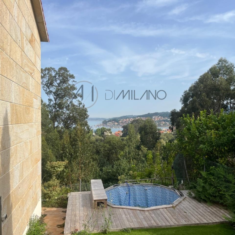 Chalet pareado de piedra con piscina, 4 habitaciones y gran terraza en Vilariño (Cangas).