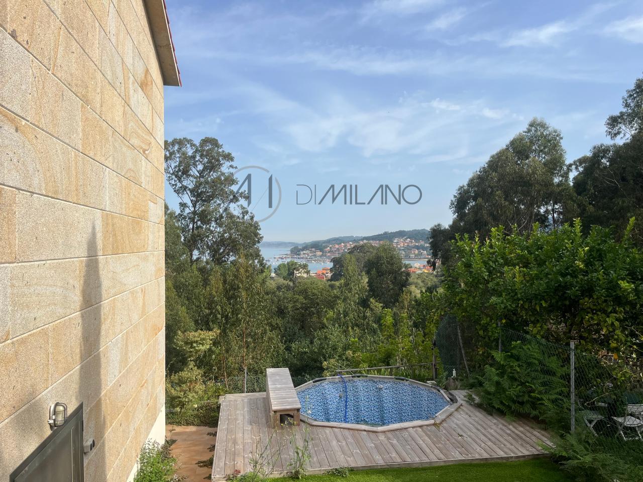 Chalet pareado de piedra con piscina, 4 habitaciones y gran terraza en Vilariño (Cangas).