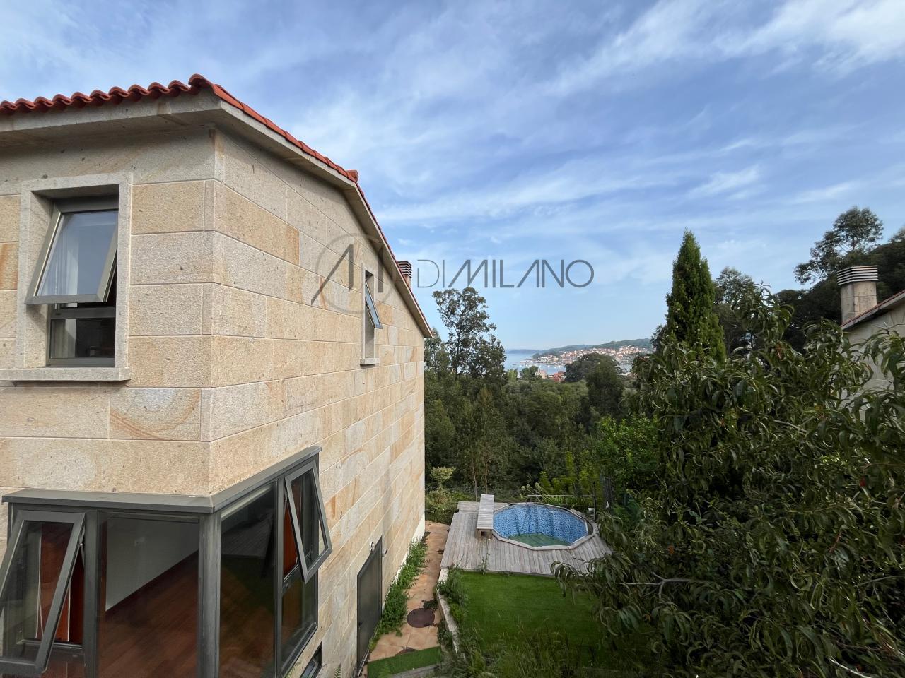 Chalet pareado de piedra con piscina, 4 habitaciones y gran terraza en Vilariño (Cangas).