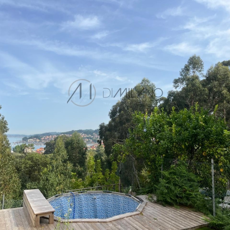 Chalet pareado de piedra con piscina, 4 habitaciones y gran terraza en Vilariño (Cangas).