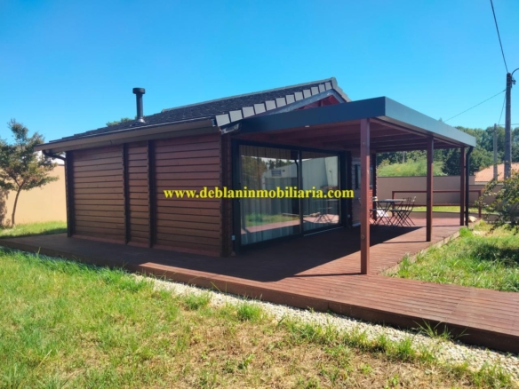 SE ALQUILA  CASA DE MADERA CON JARDÍN EN VALENÇA DO MINHO