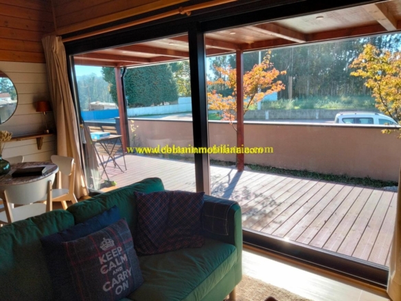 SE ALQUILA  CASA DE MADERA CON JARDÍN EN VALENÇA DO MINHO