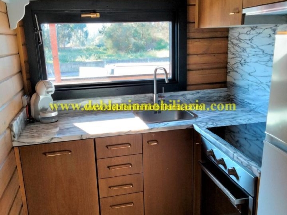 SE ALQUILA  CASA DE MADERA CON JARDÍN EN VALENÇA DO MINHO