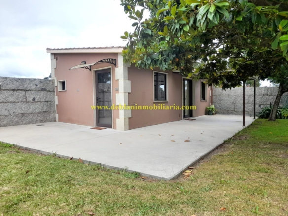 CASA DE UNA HABITACIÓN CON JARDÍN