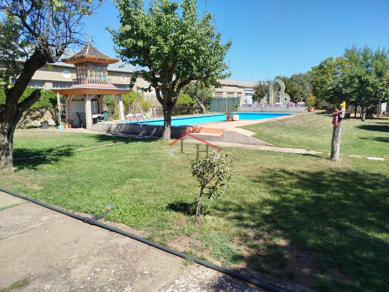 179277191898500046148_179137338892 CASA CON PISCINA Y NAVES INDUSTRIALES EN SAN ANDRÉS DEL RABANEDO