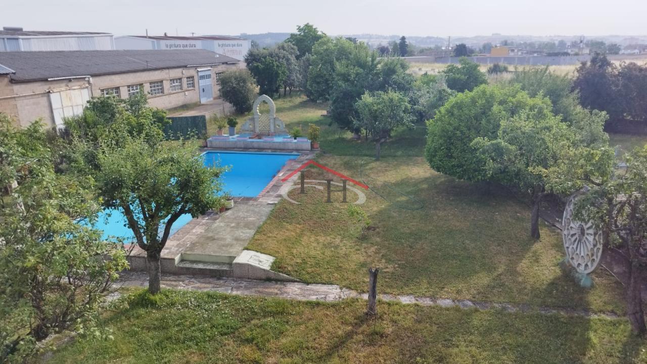 179277193546000046148_179137338967 CASA CON PISCINA Y NAVES INDUSTRIALES EN SAN ANDRÉS DEL RABANEDO